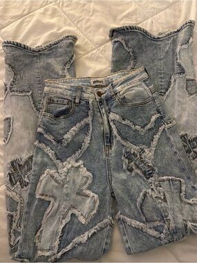 Aphrodite Light Blue Distressed Flare Jeans with Cross Patchwork
